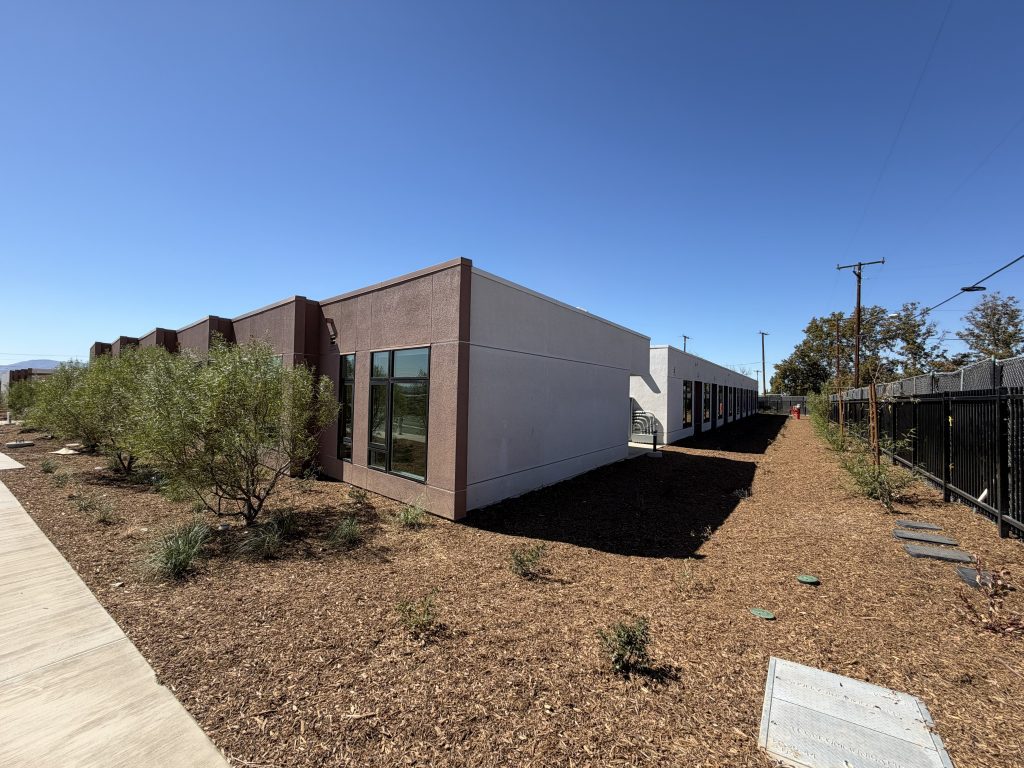 Highland Creek Side Building View