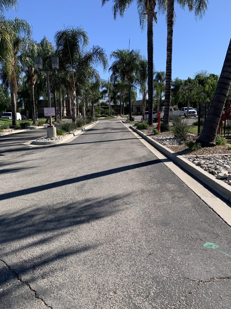 Eye-level view of Sheriff-Coroner parking lot entry before project start.