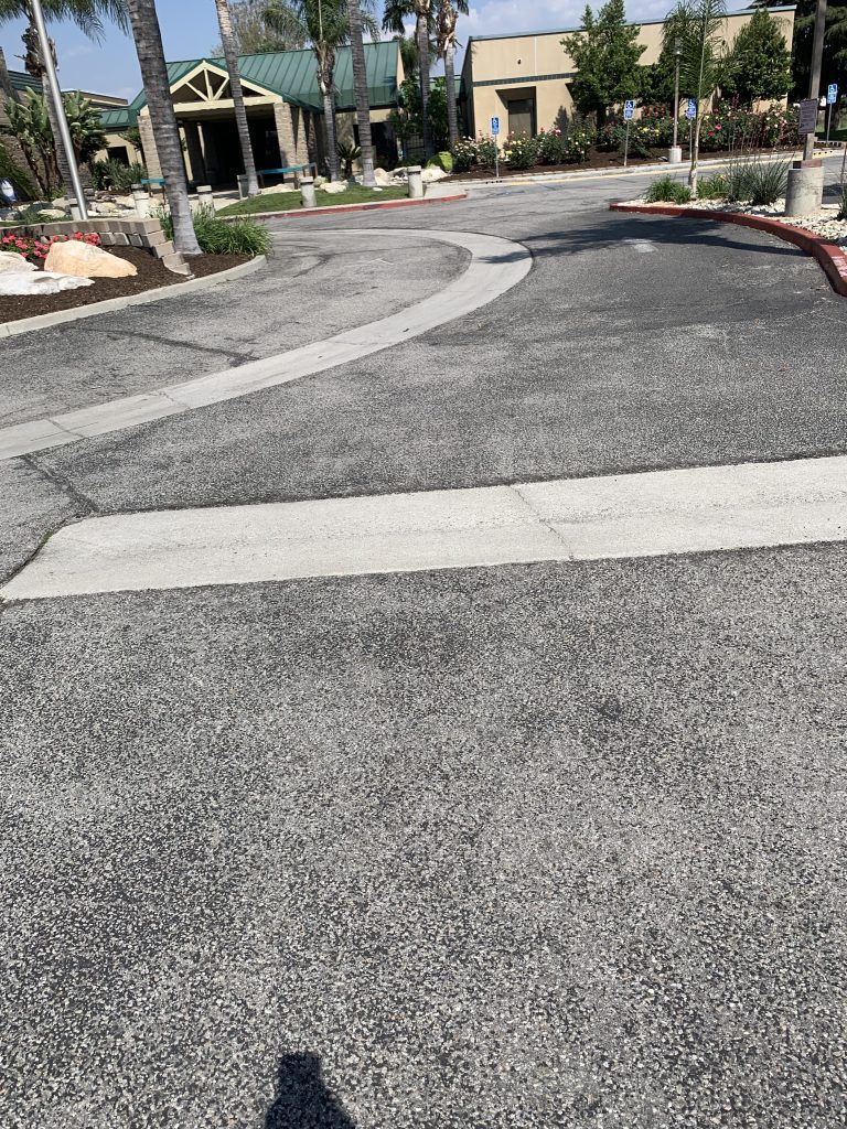 Eye-level view of Sheriff-Coroner parking lot Roundabout before project start.